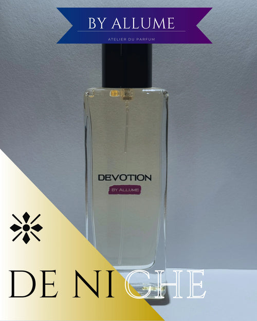 Clear glass perfume bottle labeled Devotion by Allume, black cap, modern minimal design